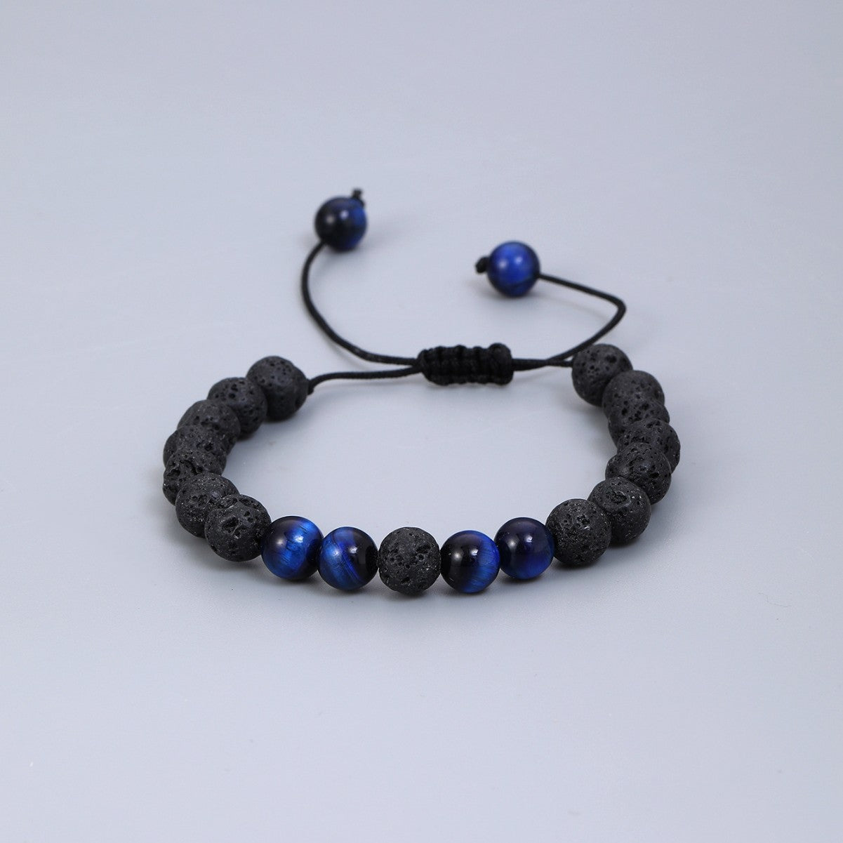 Cross-border hot sale volcanic stone blue tiger eye woven adjustable bracelet elastic rope lovers beaded bracelet manufacturers in stock